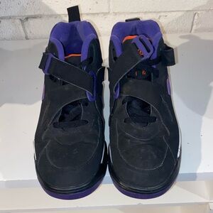 Nike Black Sneakers with Purple Lining and Orange Tongue